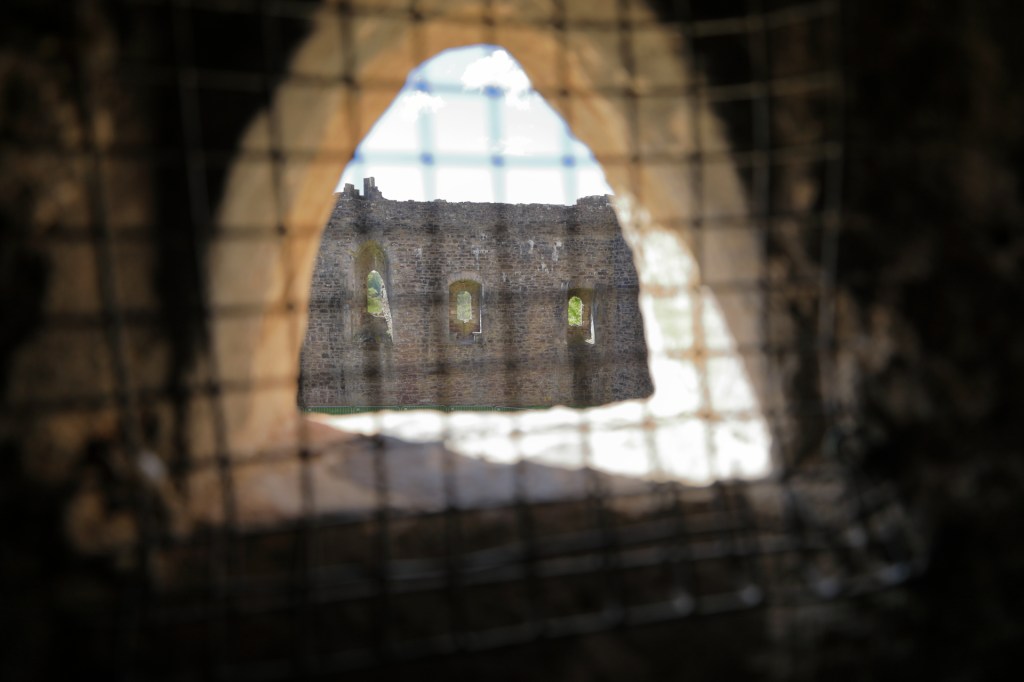 Doune castle view through screened window