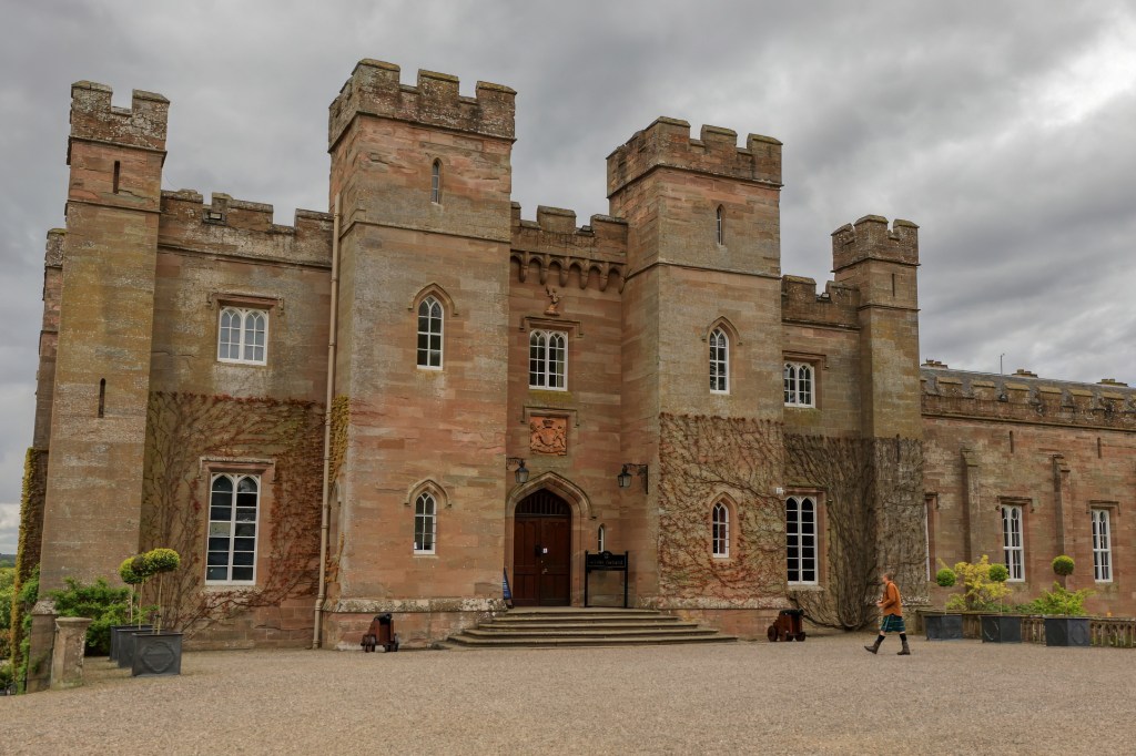 Scone Palace entrance with person in kilt