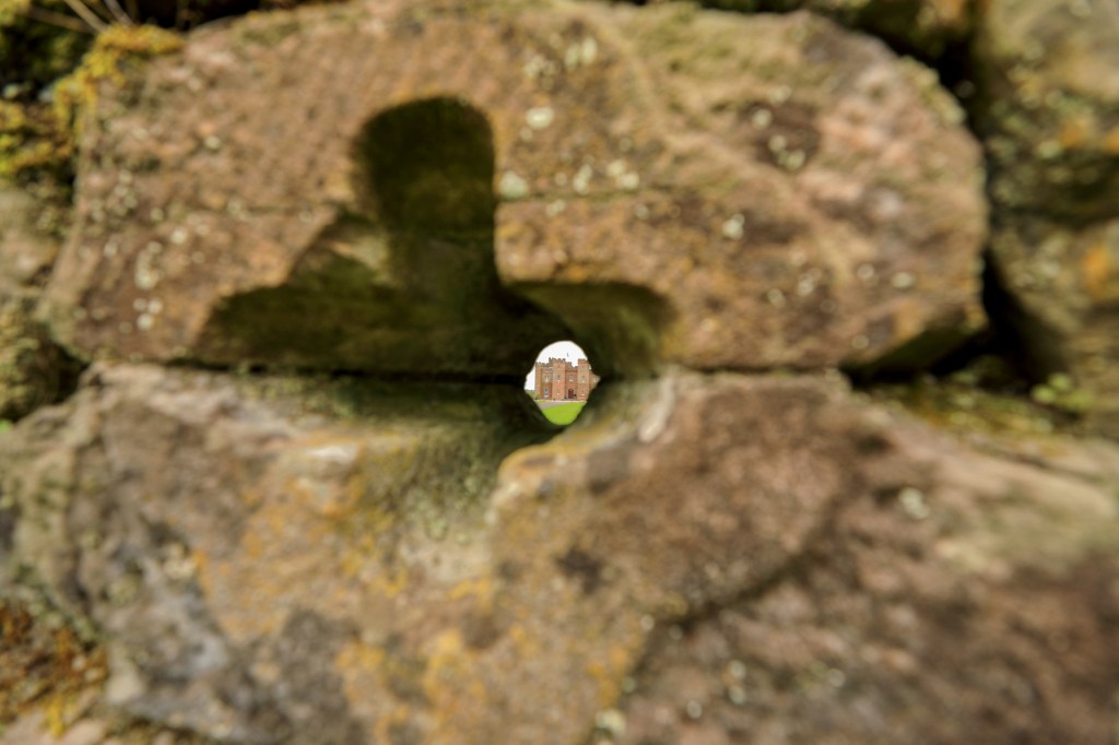 View of Scone Palace through an archer's hole