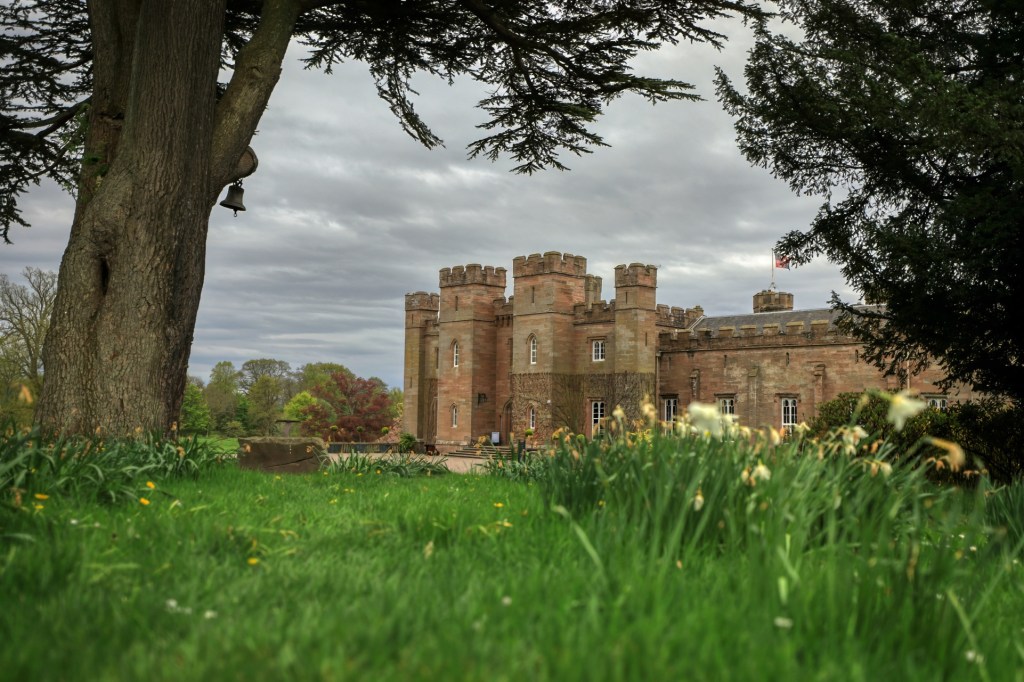 View of Scone Palace through garden
