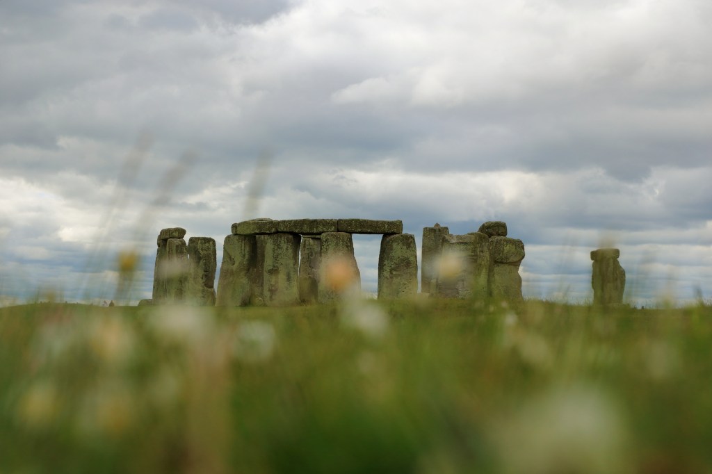 Stonehenge low angle with blurry grass foreground