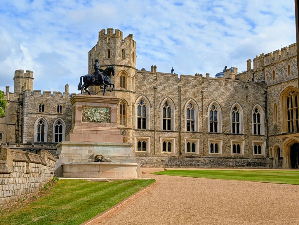 Windsor Castle courtyard with man on horse statue